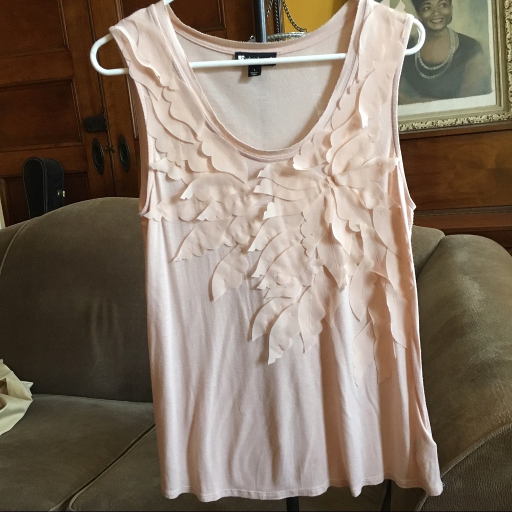 Sleeveless top with flower petal appliqué