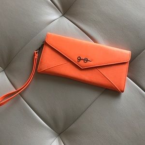 Neon Jessica Simpson clutch