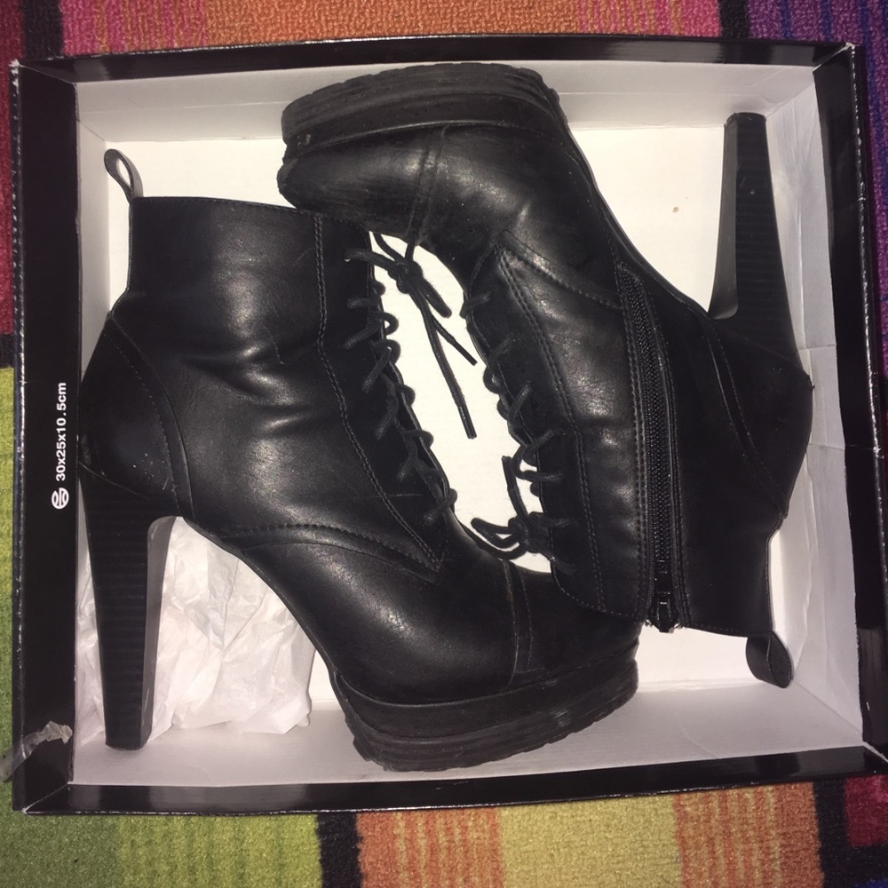 Black high heeled combat boots