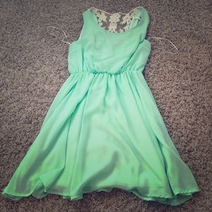 Short sleeve dress with lace back.