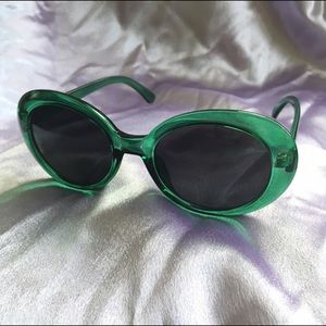 green oval sunglasses