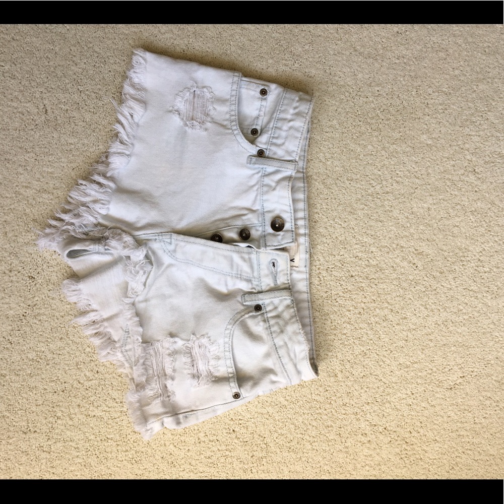 White, high waisted shorts. Good condition