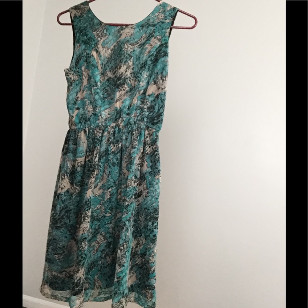 Green tan black dress