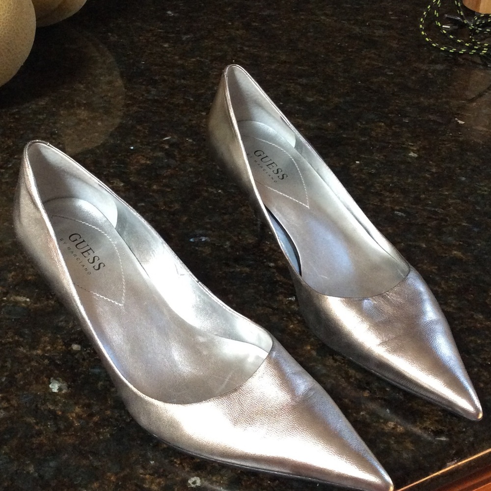 Guess silver low heels.   Great condition.