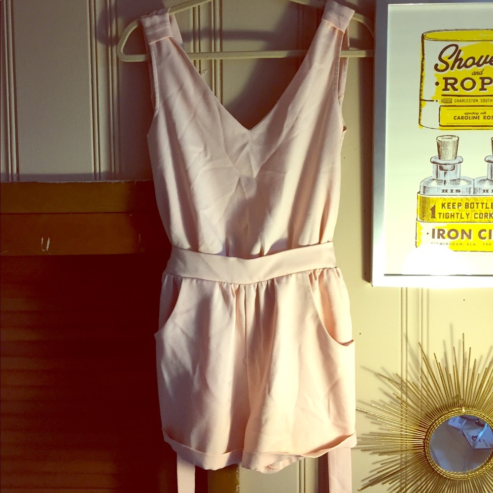 Pretty in pink romper with pockets!