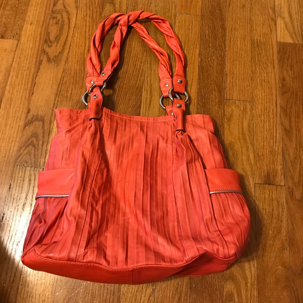 Coral colored Makowsky purse