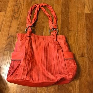 Coral colored Makowsky purse