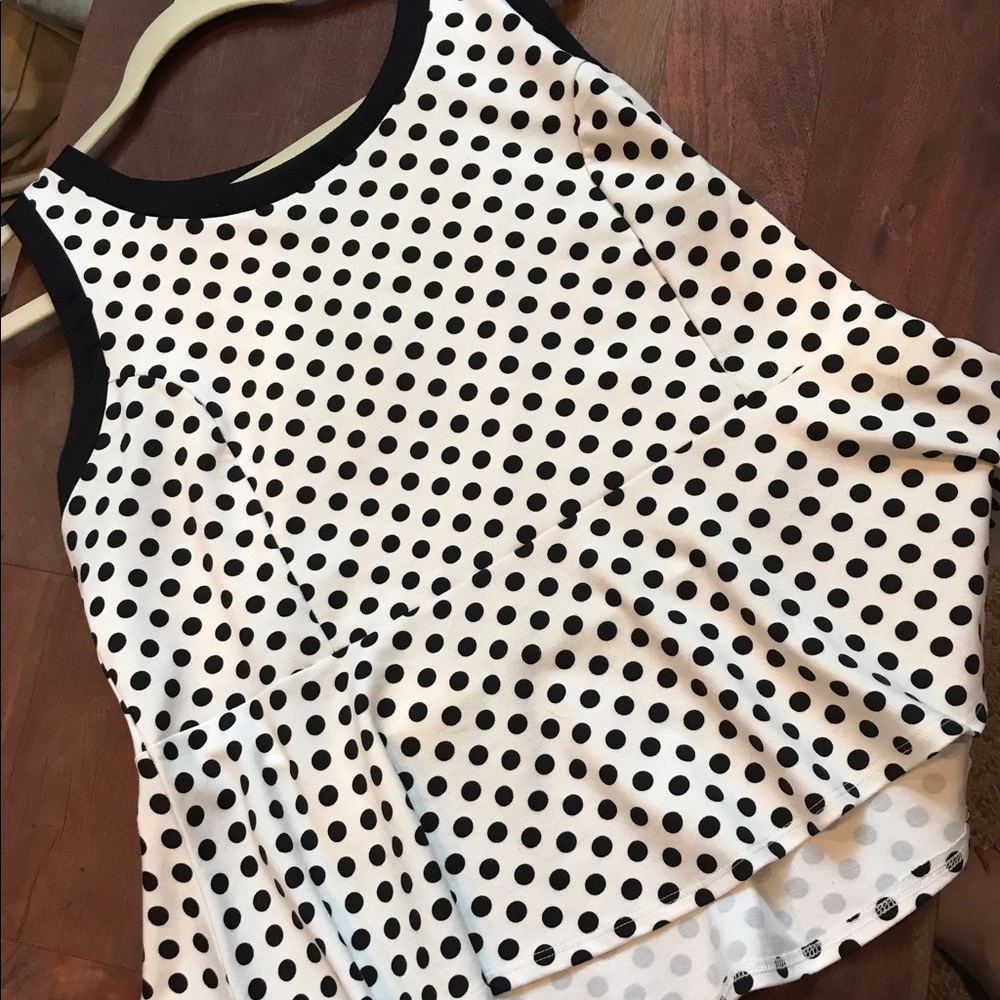 Adorable polka dotted peplum top