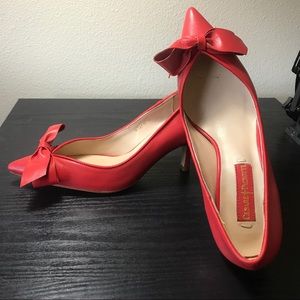 Cesare Paciotti Red heels with bow