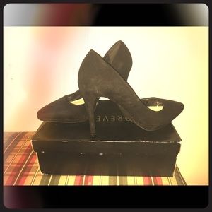 Black suede pumps