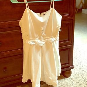 Ivory Romper with embroidered flowers