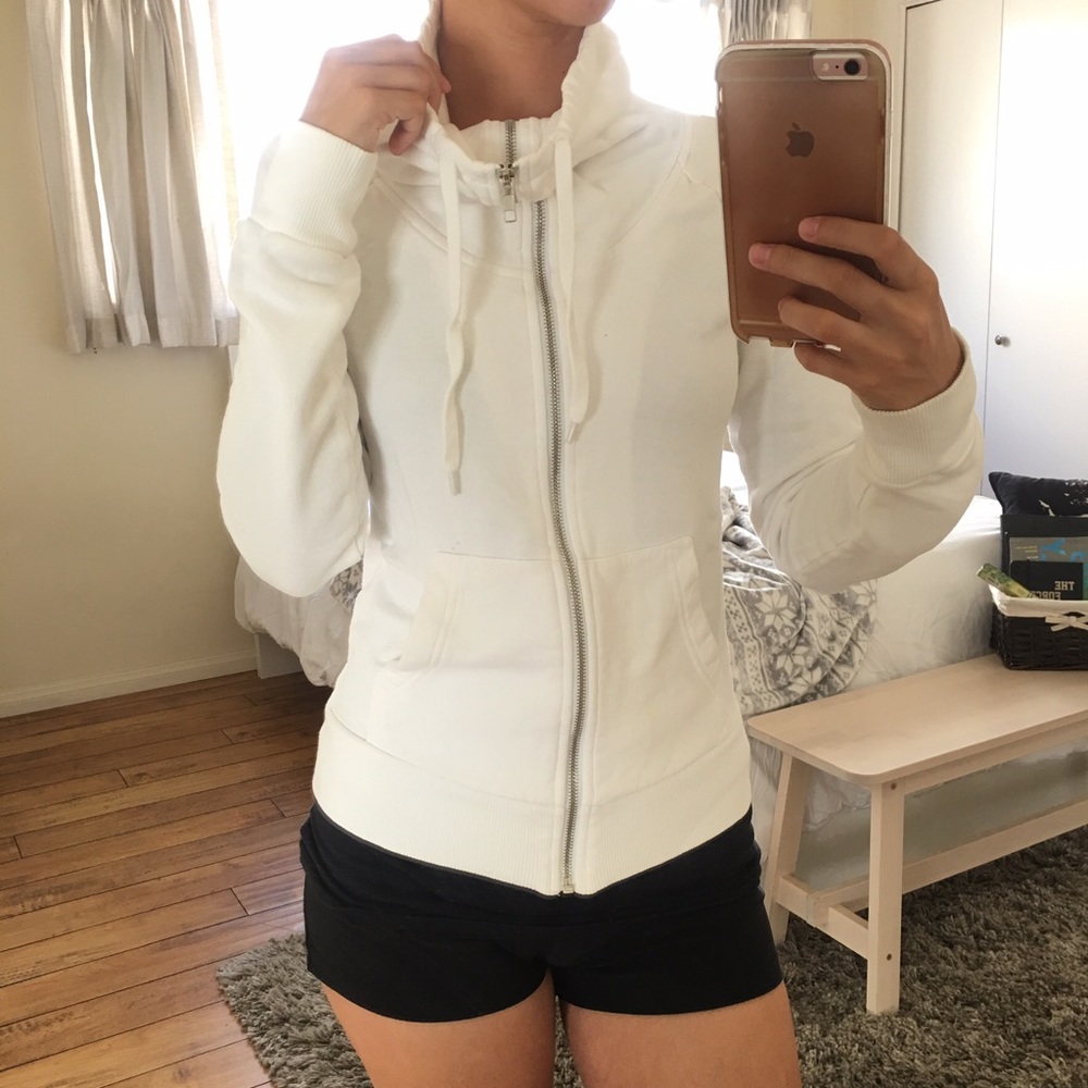 White athletic sweater