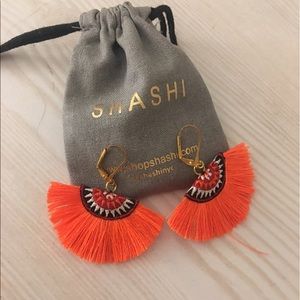Shashi Shannon orange tassel earrings