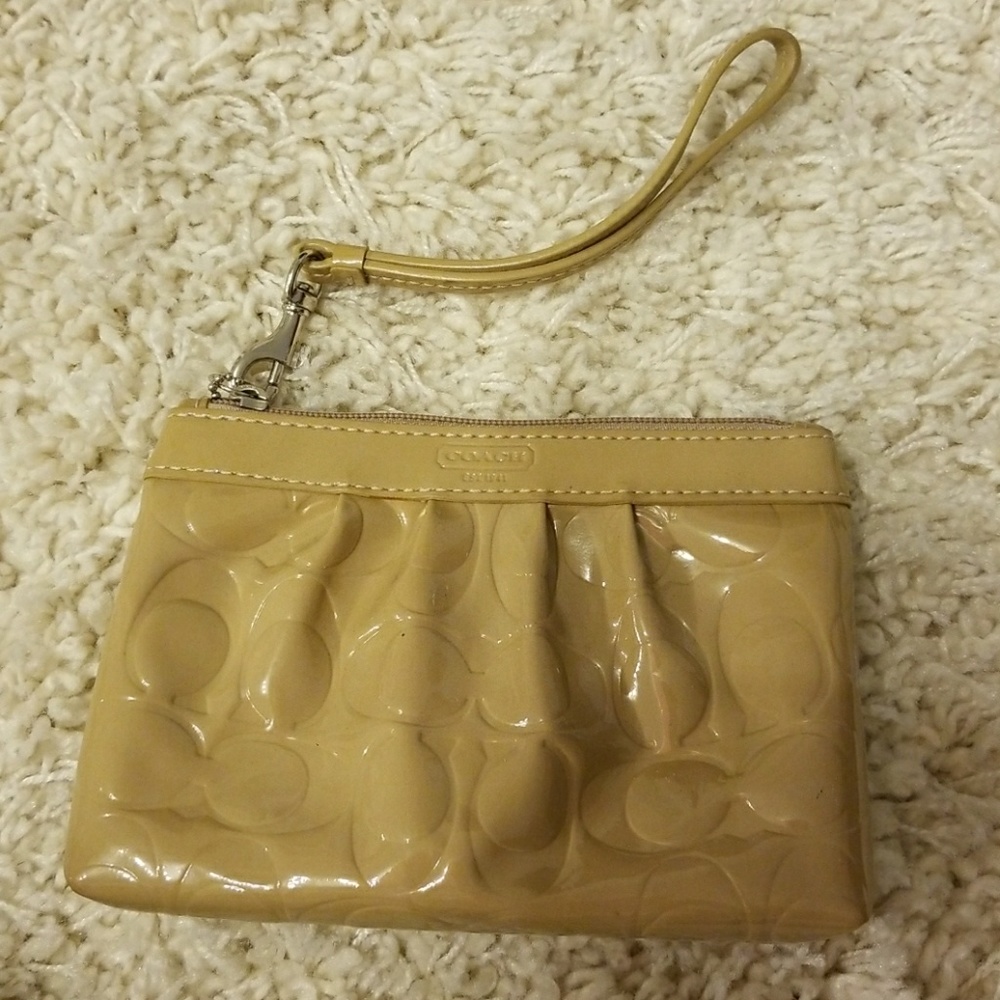 Coach beige patent wristlet
