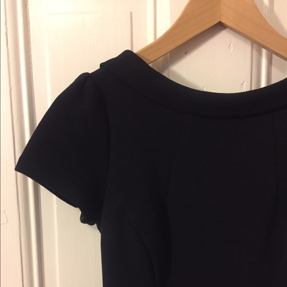 Form fitting dress with a flattering neckline!