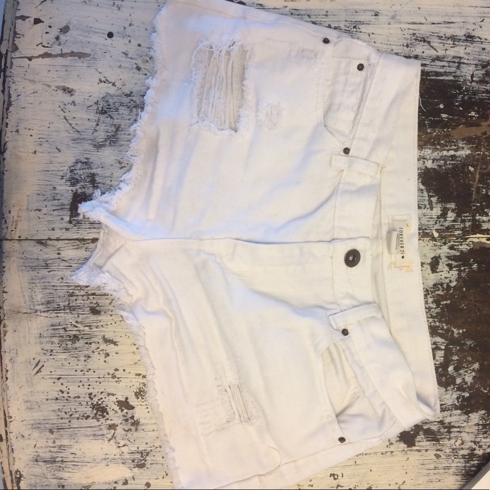 White cut-off jean shorts
