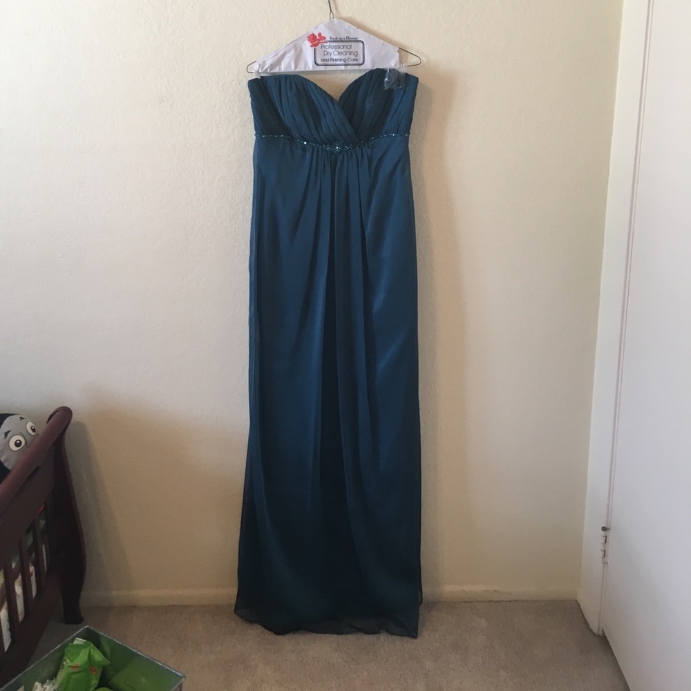 Turquoise strapless bridesmaid dress by Jasmine