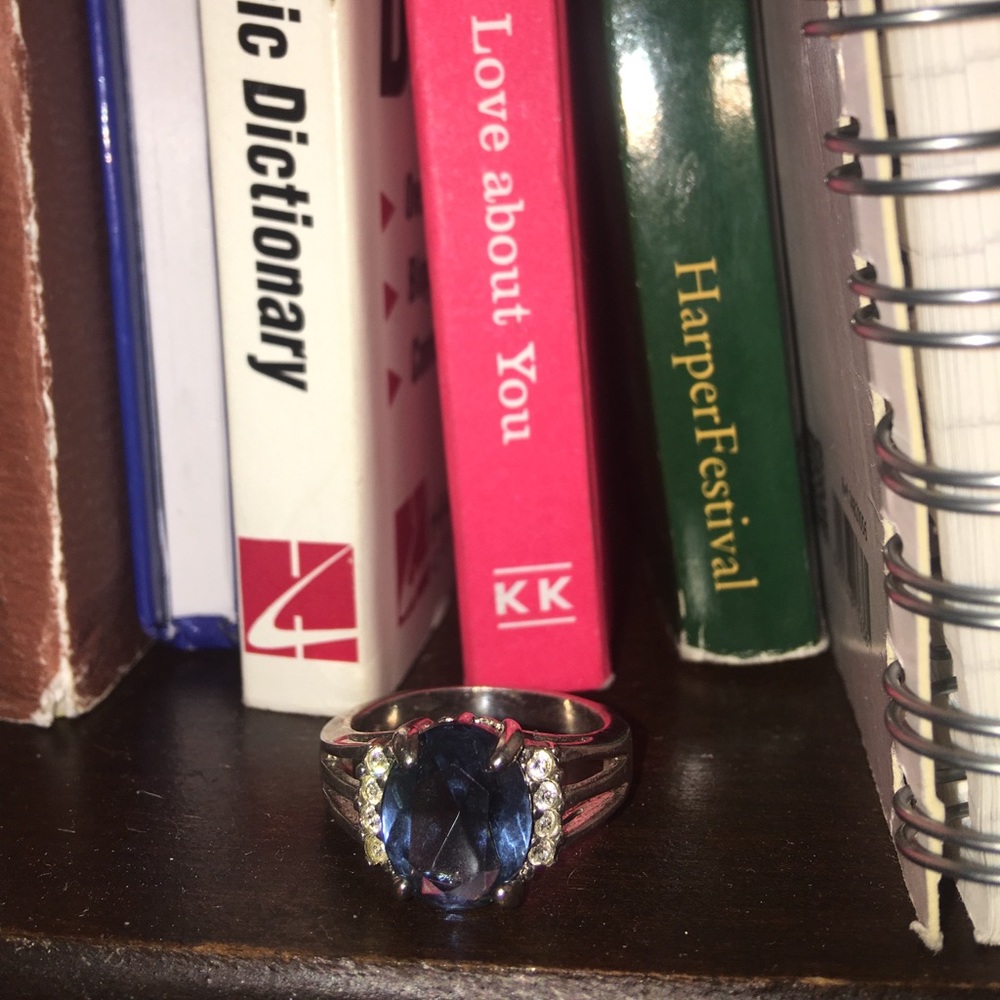 Silver band with blue reflective stone ring