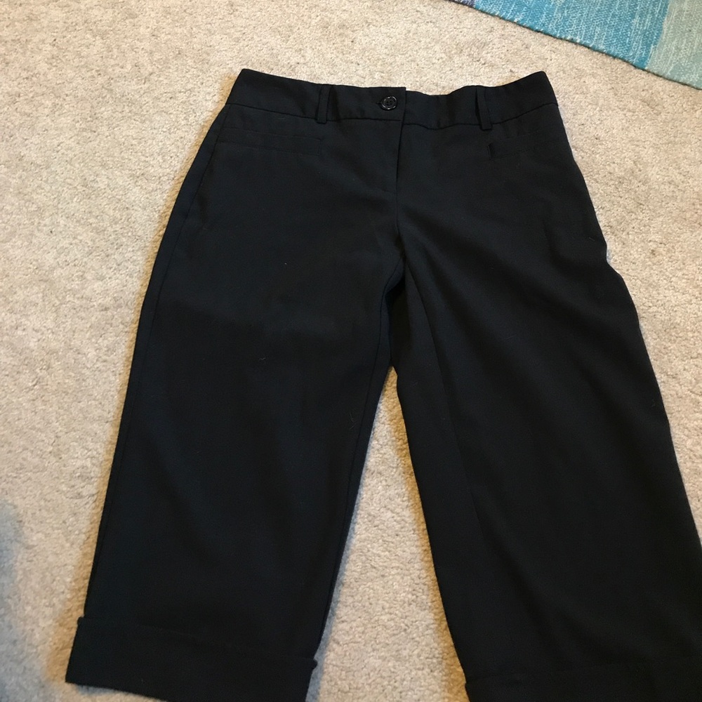 Black dressy khaki pants.