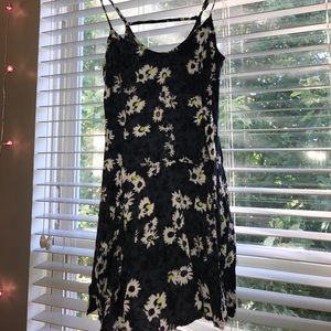 a cute little dark blue sundress with daisies.