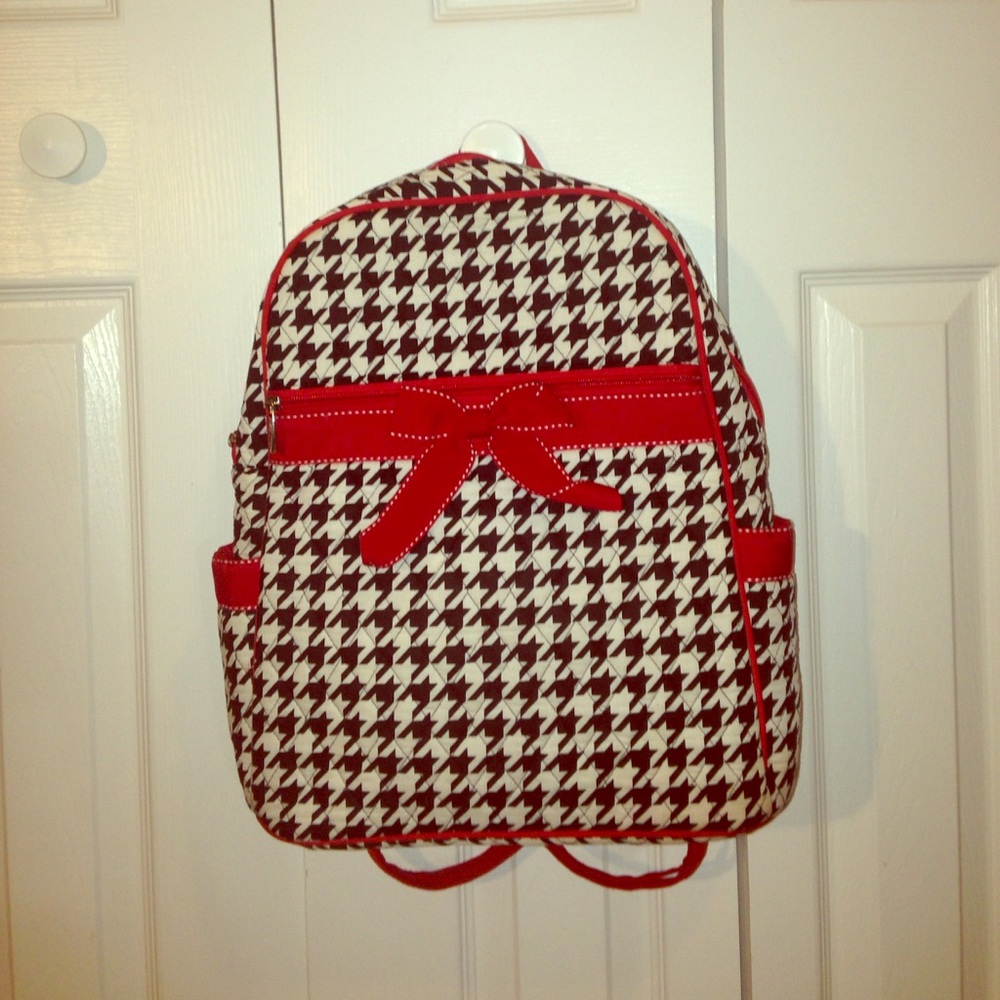 Red , black and white patterned backpack