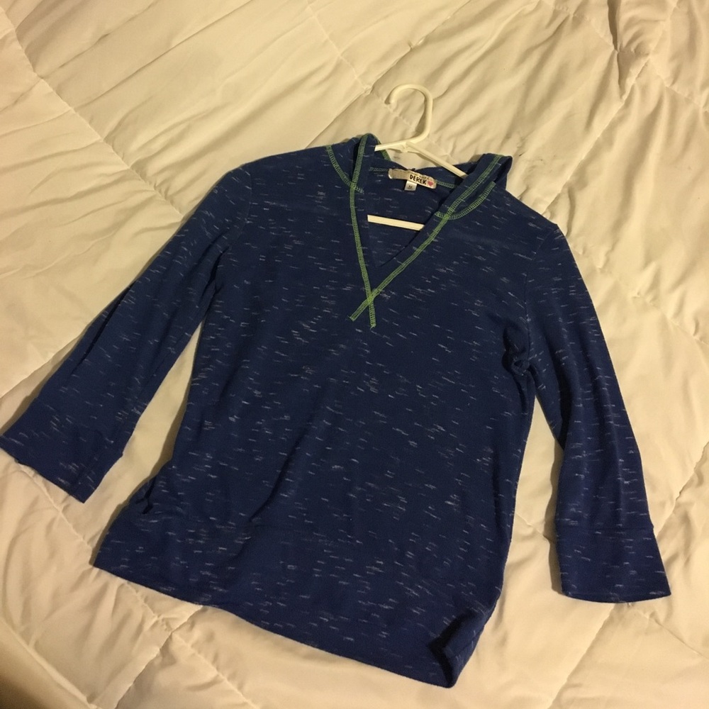 Blue hooded shirt, size medium.
