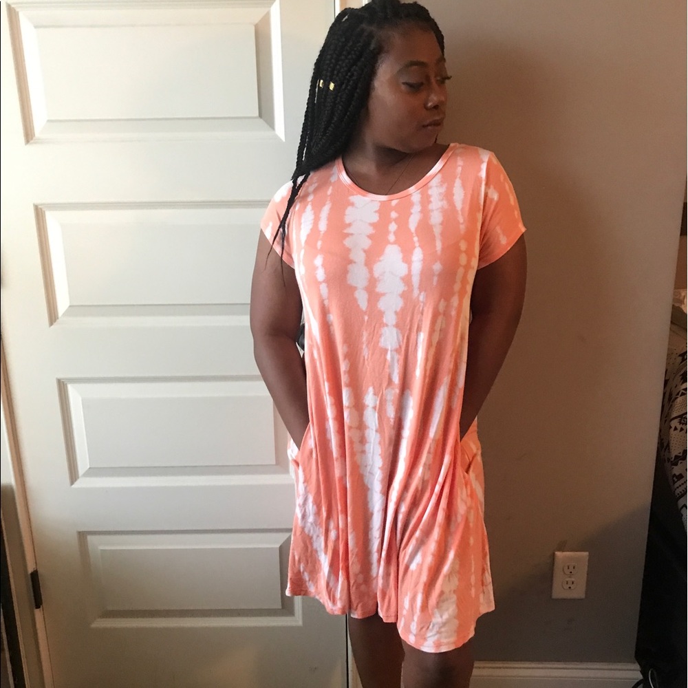 This beautiful orange and white shift dress!