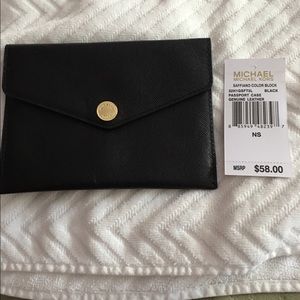 Michael Kors black leather passport case