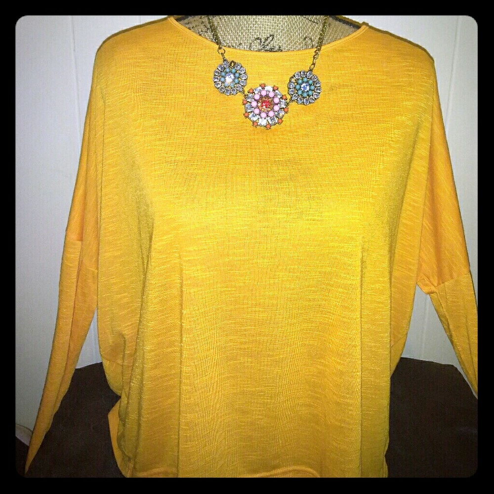Orange/yellow open back blouse