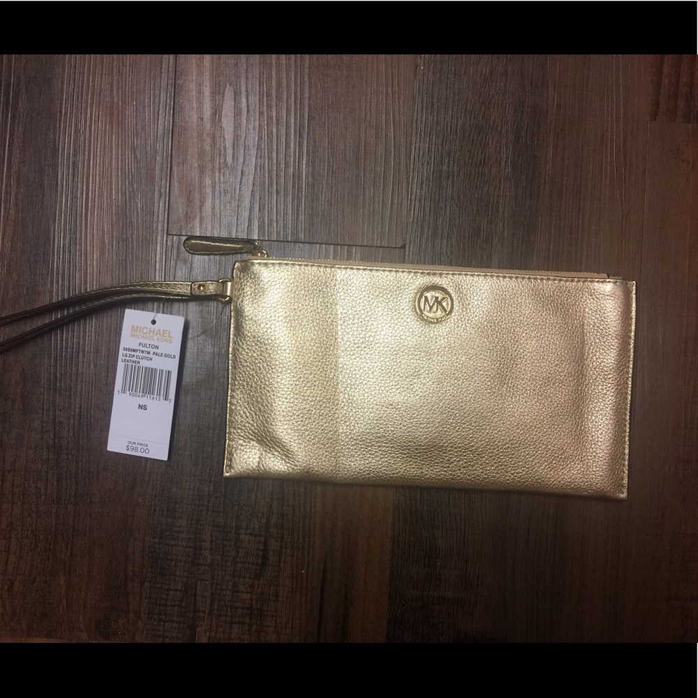 Gold Michael kors wristlet