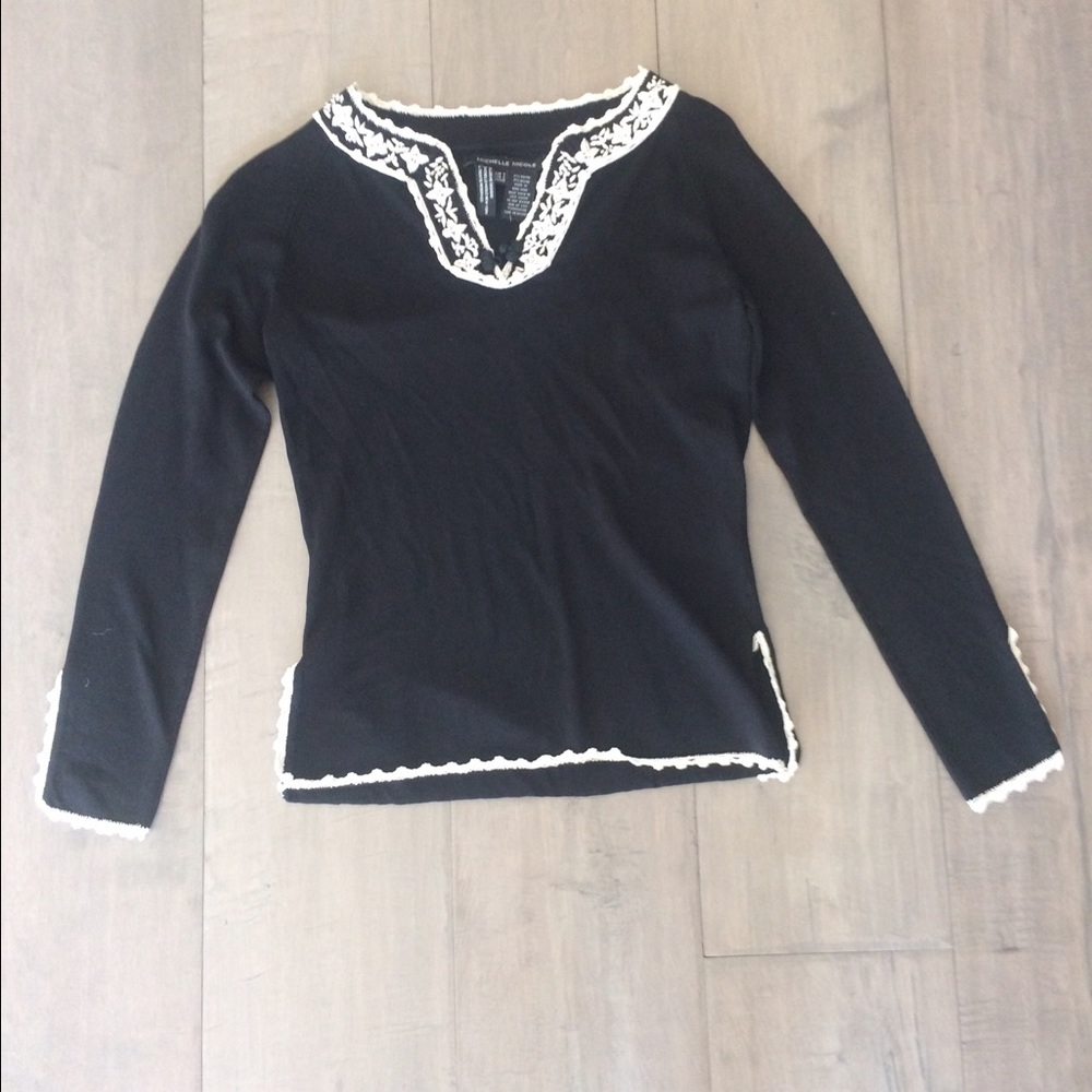 Black sweater with white edge