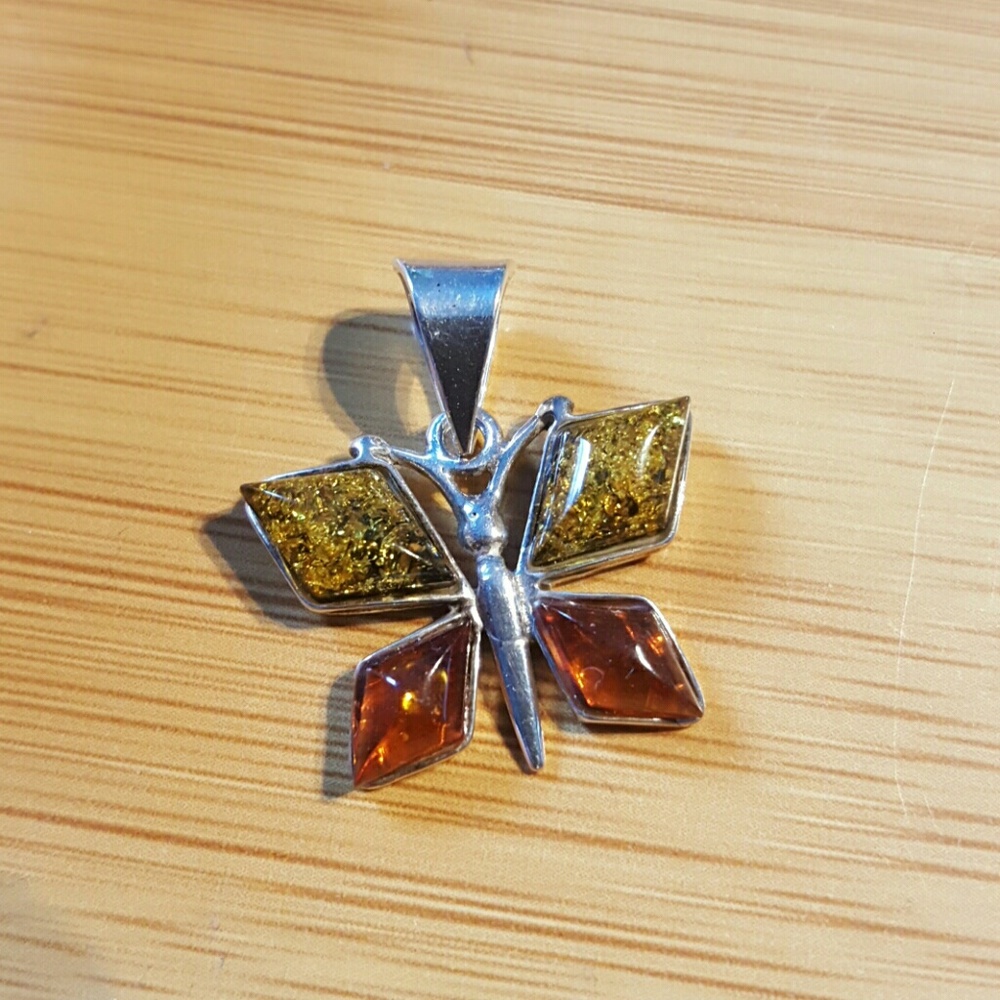 Baltic amber butterfly sterling silver pendant