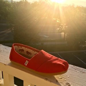 TOMS classic red slip ons, size 5.5