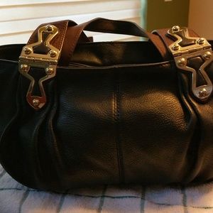 Medium shoulder bag. No stains.