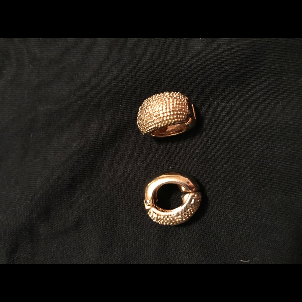 Gold cuff costume earrings