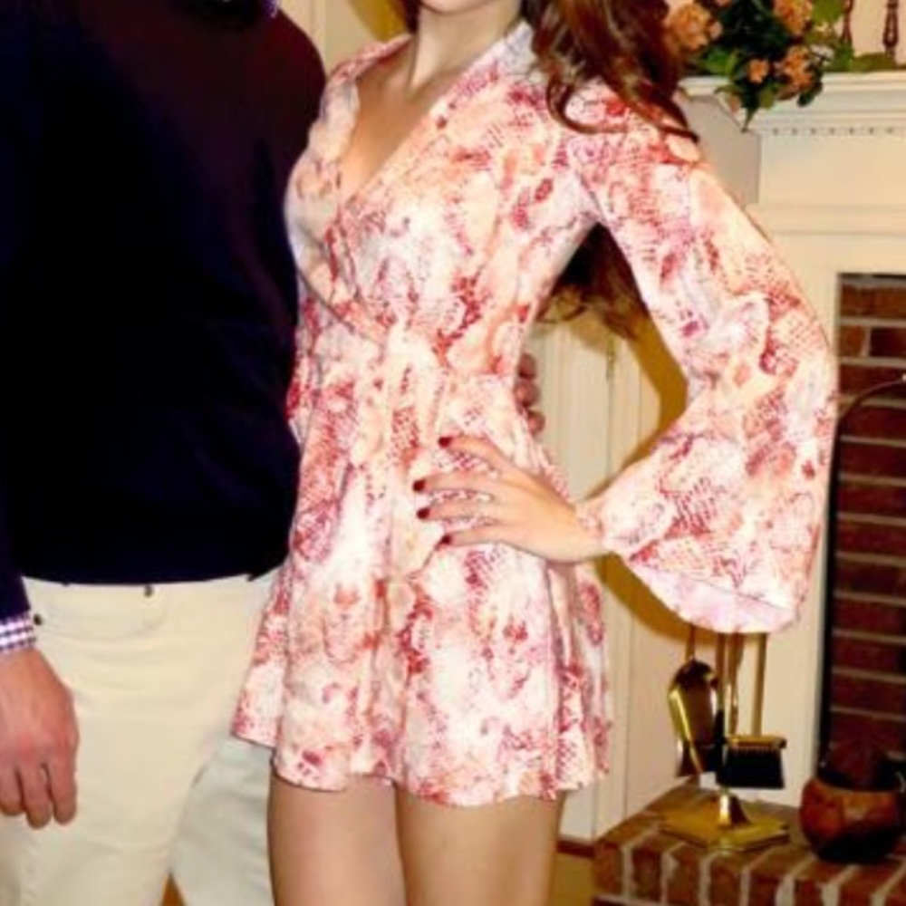 Pink and white romper.