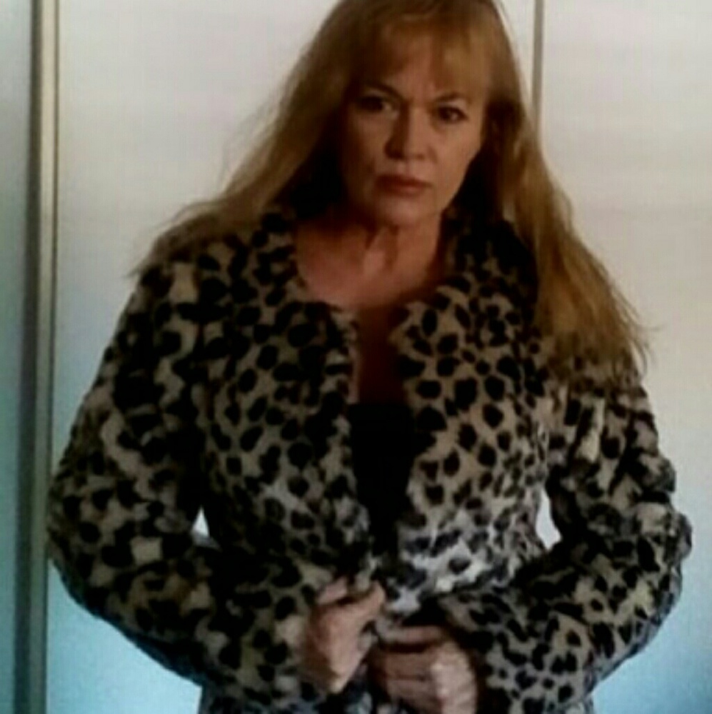 Leopard print coat.