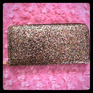 Silver sparkling wallet.