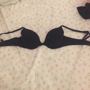 Black pink Victorias secret bra in the size 34B.