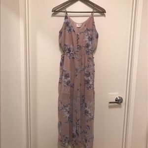 Floral jumpsuit with side cutouts. NWT