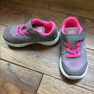Gray and pink Nikes