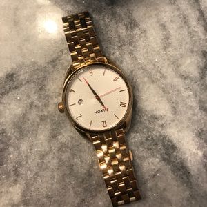 Gold Nixon watch