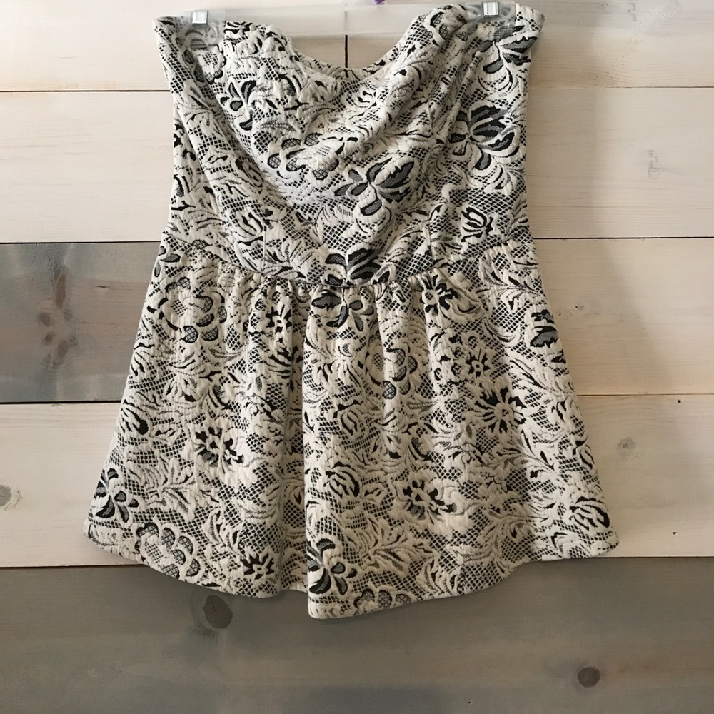 Strapless top with peplum
