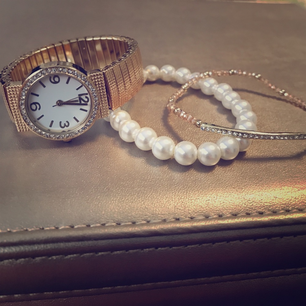 Fashion watch with bracelets.