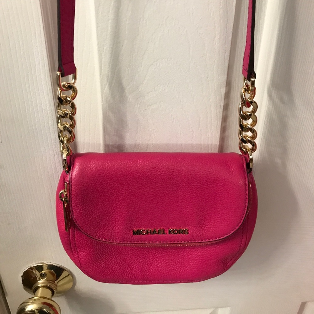 MK pink crossbody bag.