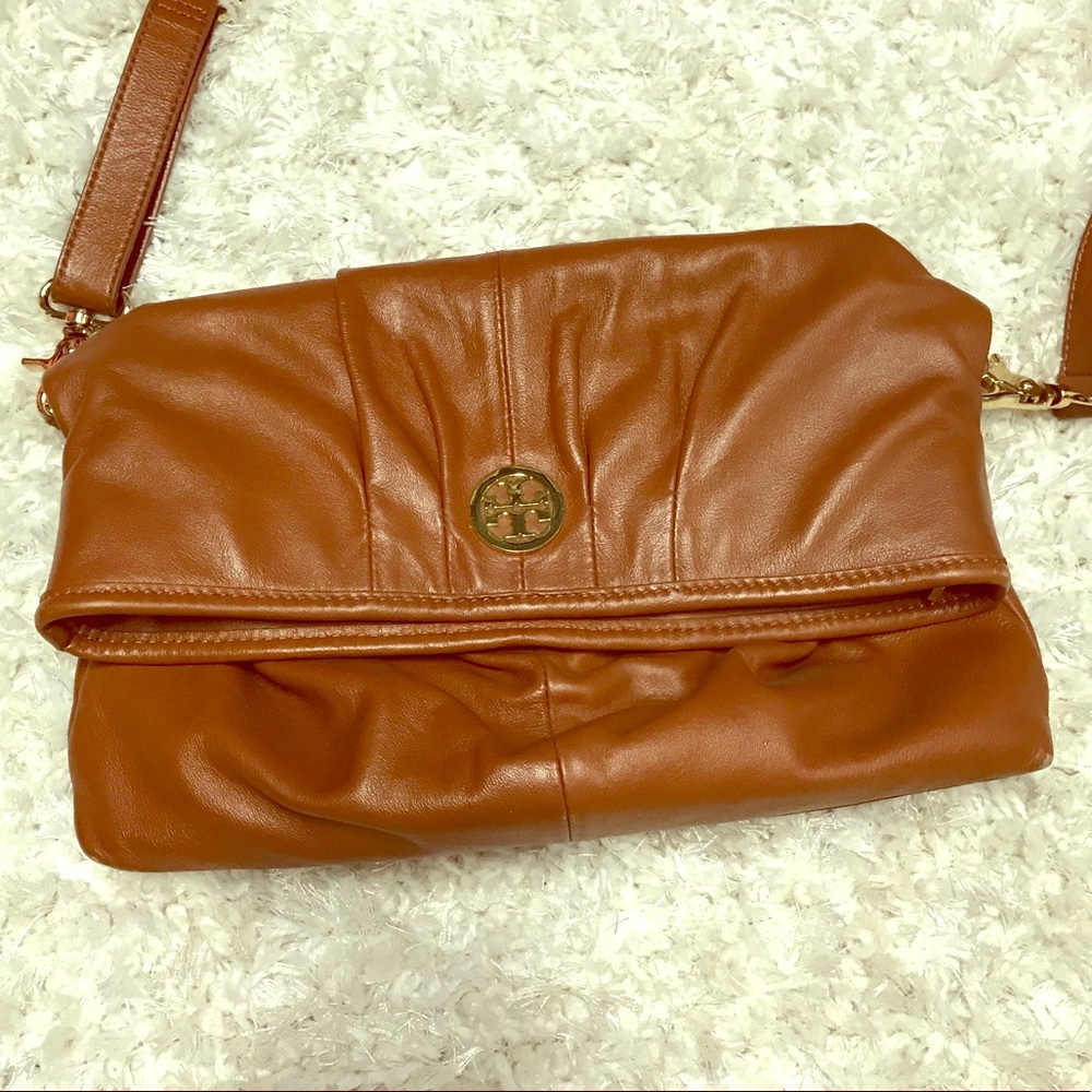 Tory Burch camel colored cross body purse