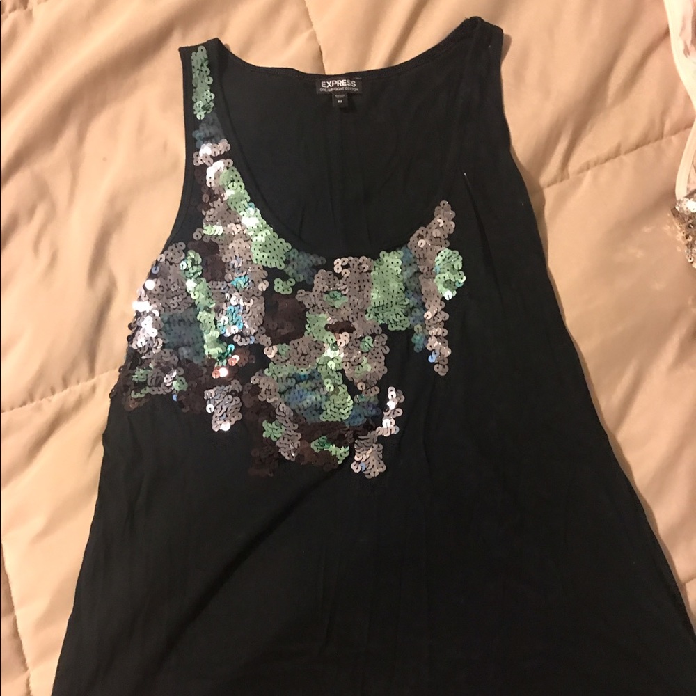 Express size M . Bundle all tank tops for $25!