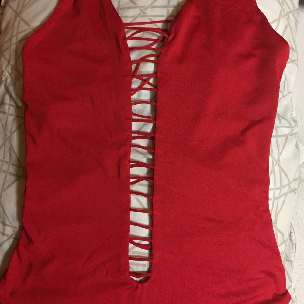 Medium red stringy one piece bathing suit