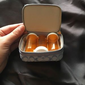 Never used Coach pill carrier