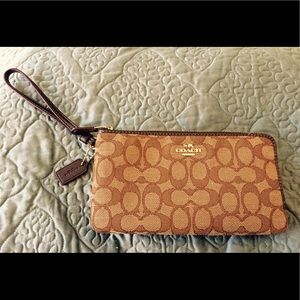 LIKE NEW Coach wristlets/wallet